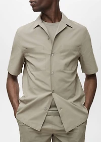 Shirt with pockets and bowling collar