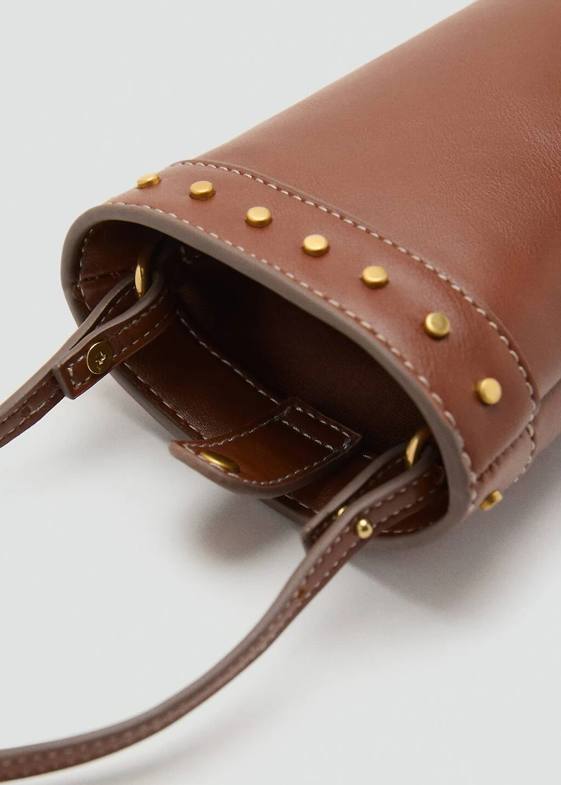 Studded cell phone case with shoulder strap