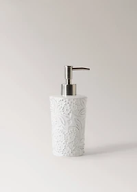 Embossed soap dispenser