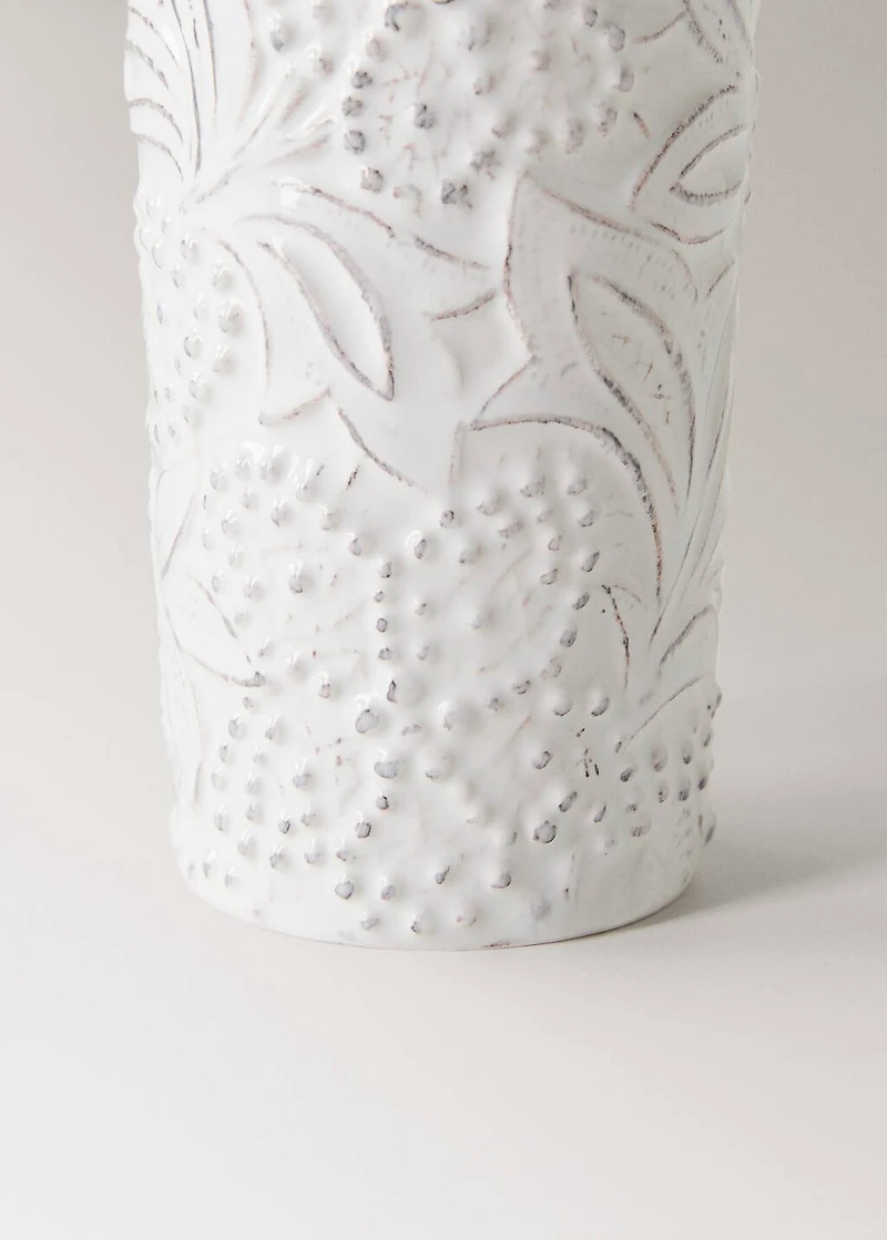 Embossed soap dispenser