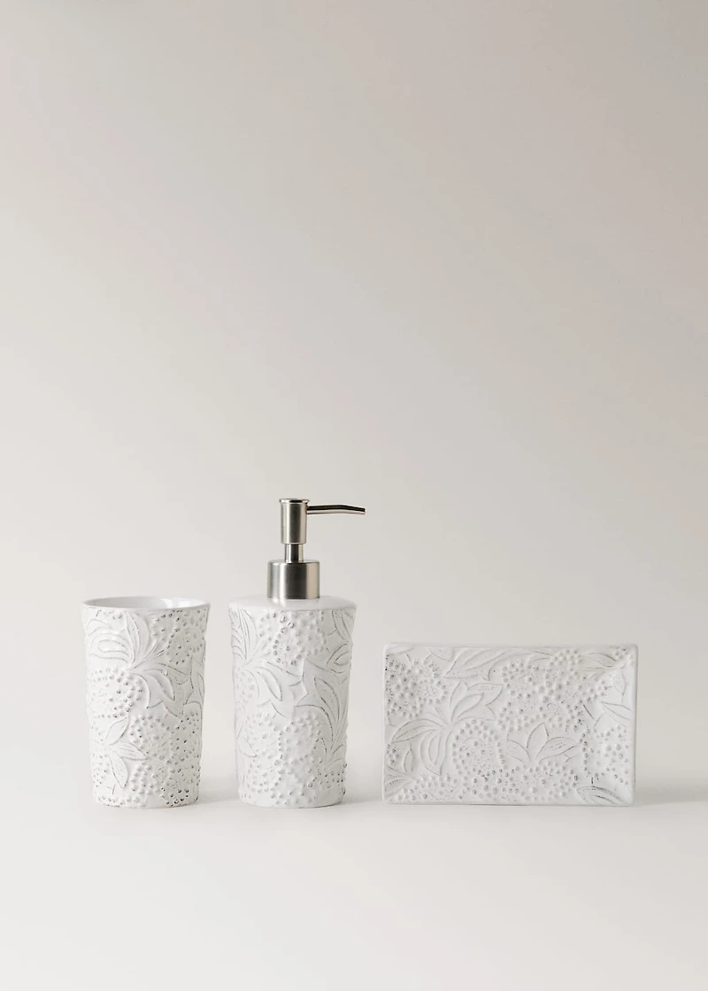 Embossed soap dispenser