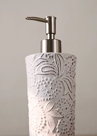 Embossed soap dispenser