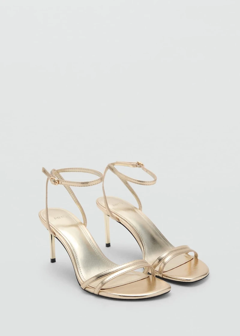 Heeled sandals with straps