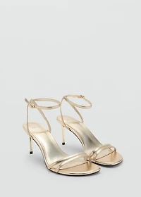 Heeled sandals with straps