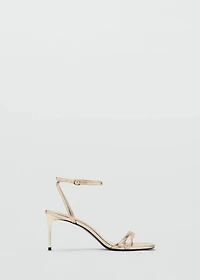 Heeled sandals with straps
