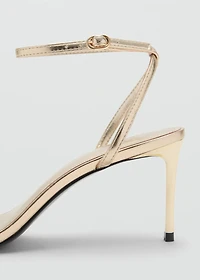 Heeled sandals with straps