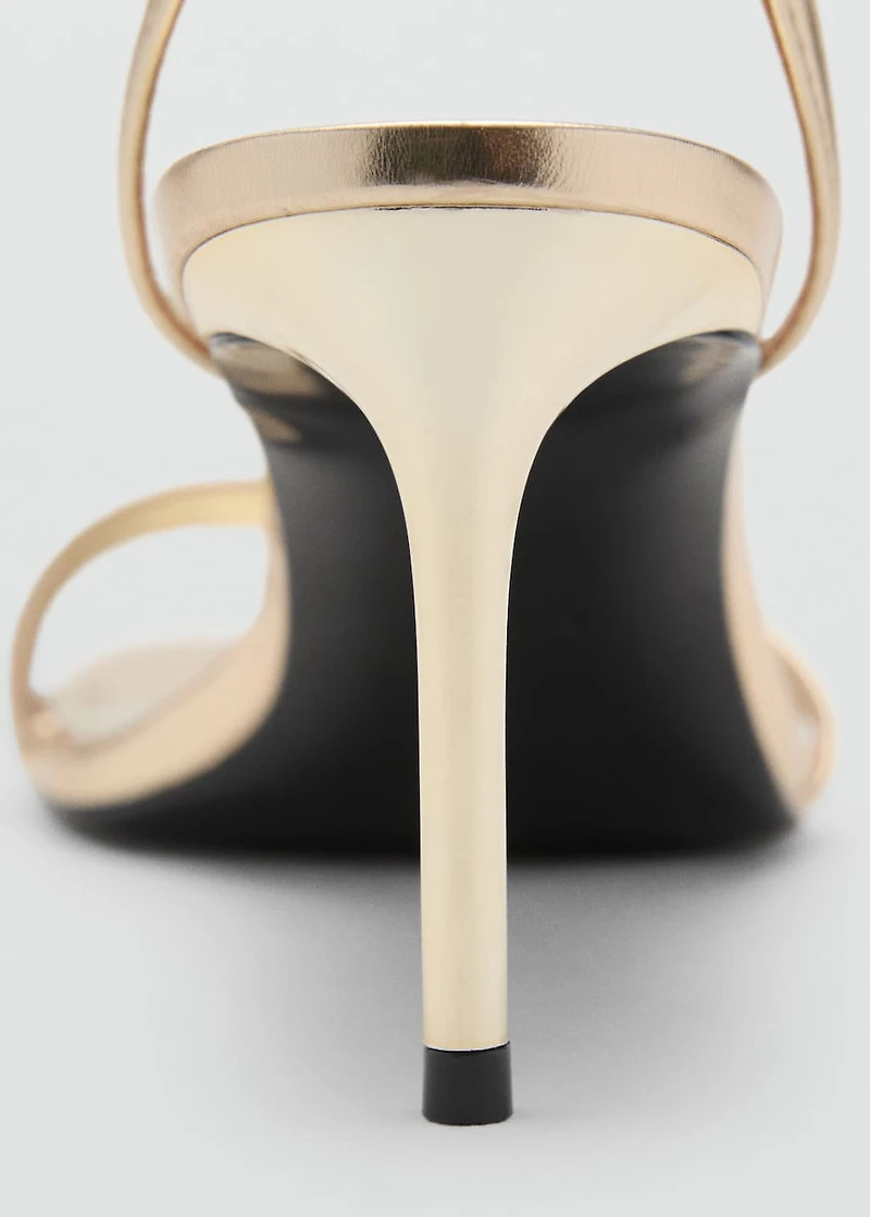 Heeled sandals with straps