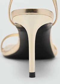 Heeled sandals with straps