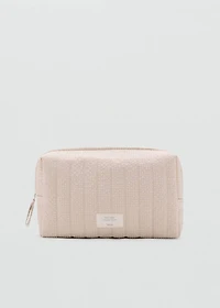 Textured toiletries bag
