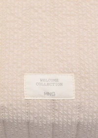 Textured toiletries bag