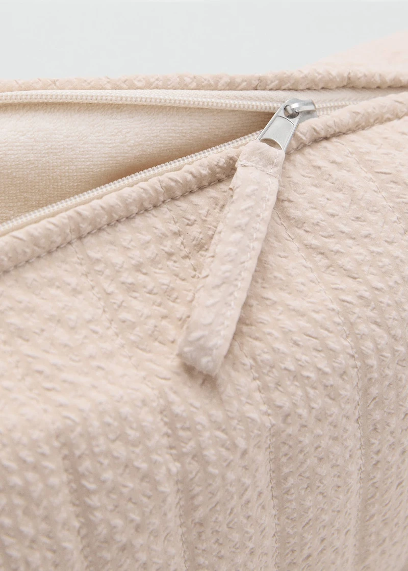 Textured toiletries bag