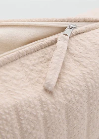Textured toiletries bag