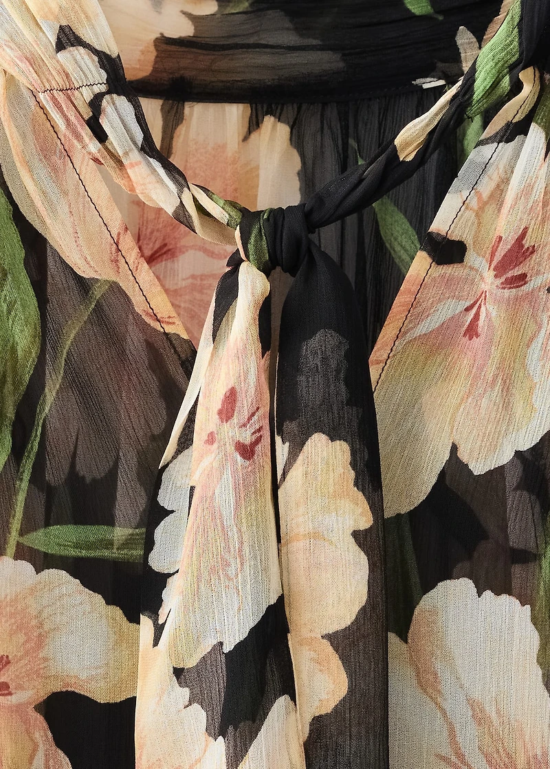 Semi-transparent floral blouse