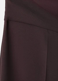 Jumpsuit with asymmetrical neck and bow