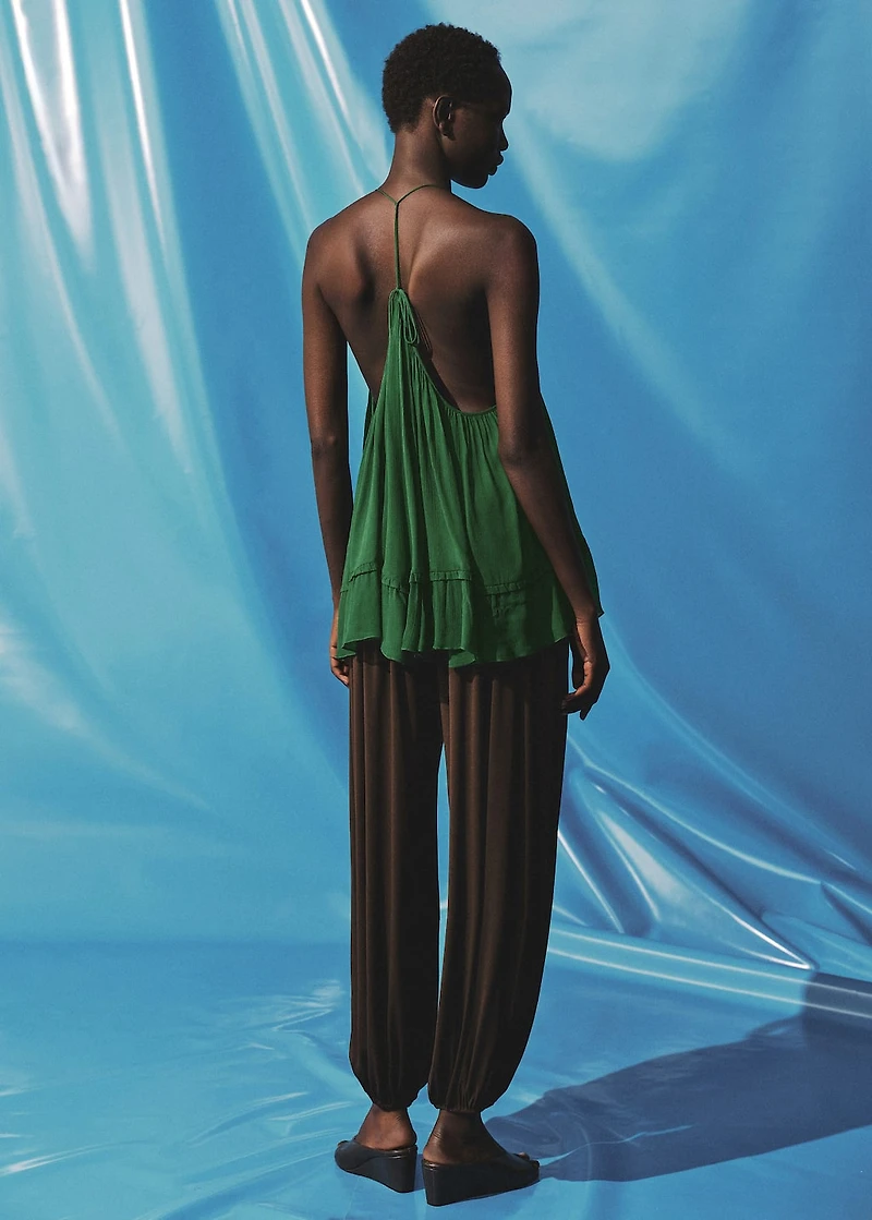 Top with pleated back neckline