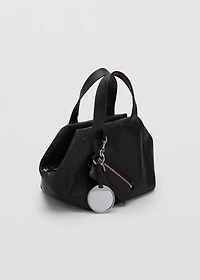 Leather clutch bag with charms