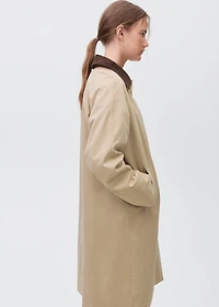 Trench coat with contrasting collar