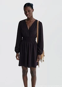 Dress with gathered waist