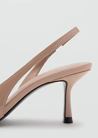 Patent heeled shoes