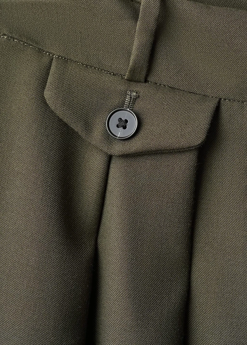 Trousers with pleats and button detail