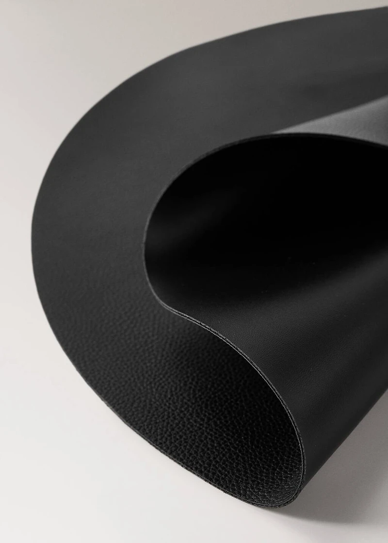 Round faux leather placemat