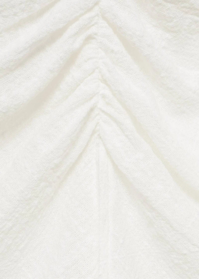 Ruffled-sleeve blouse