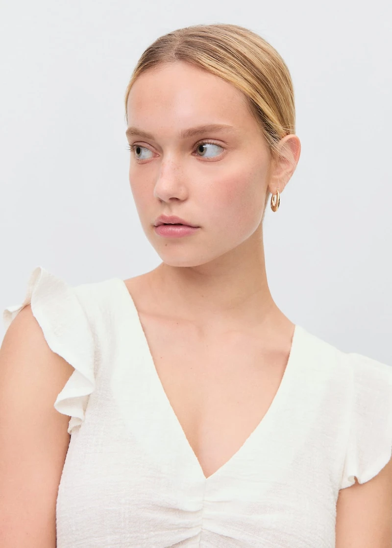 Ruffled-sleeve blouse