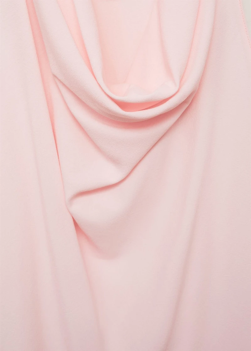 Draped blouse with flower detail