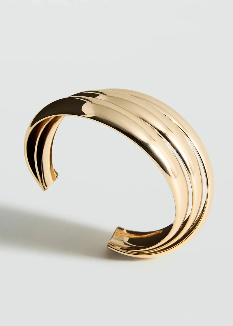 Rigid bracelet with relief