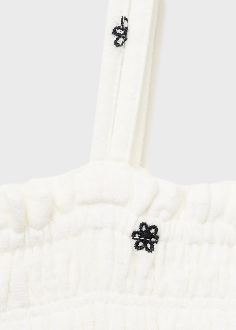 Embroidered cotton dress with floral pattern