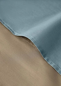 Reversible percale cotton duvet cover with contrasting piping for cot
