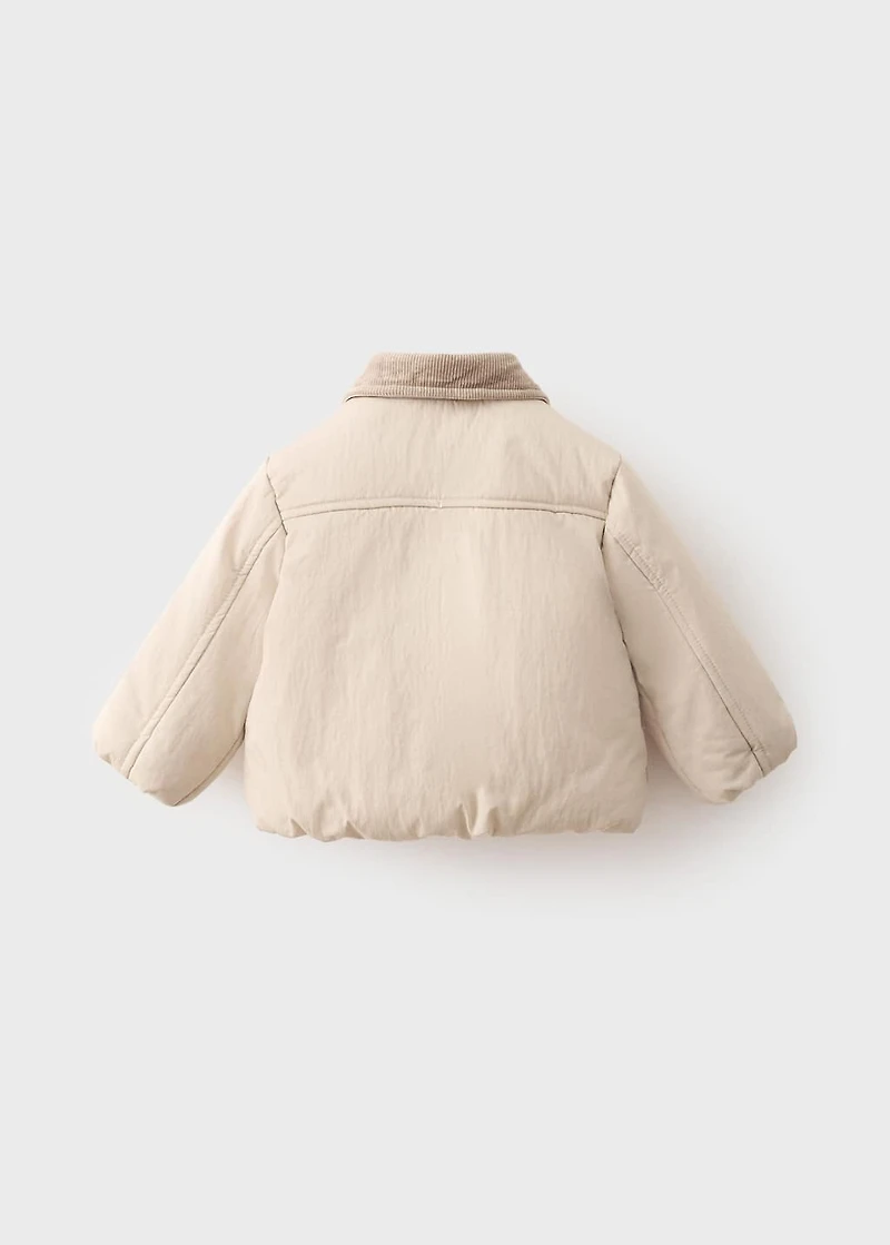 Quilted anorak with contrasting collar