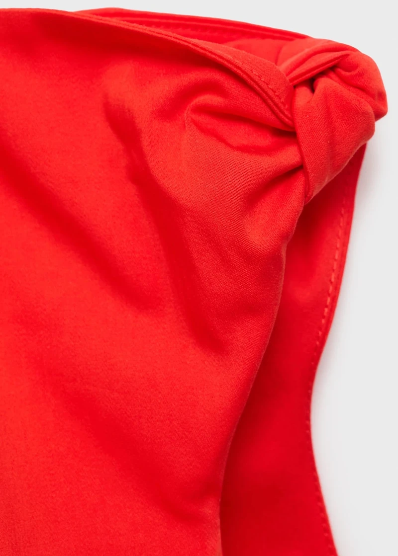 Short dress with asymmetrical neckline