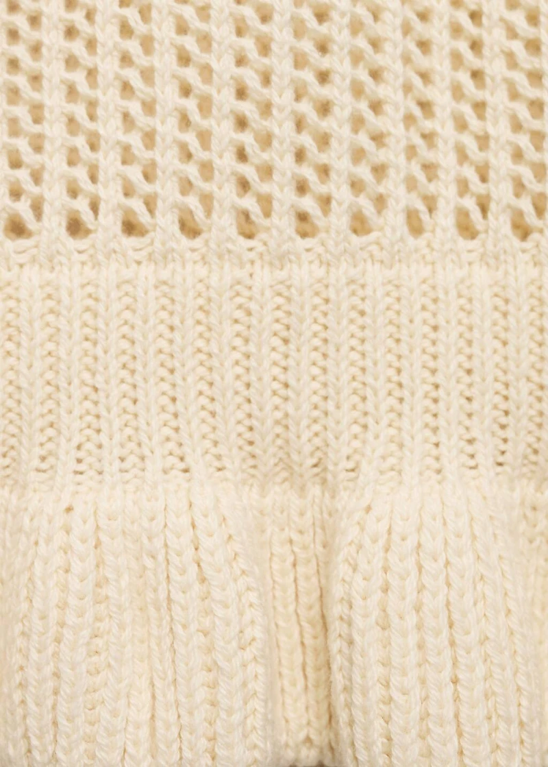 Openwork knit vest with ruffle