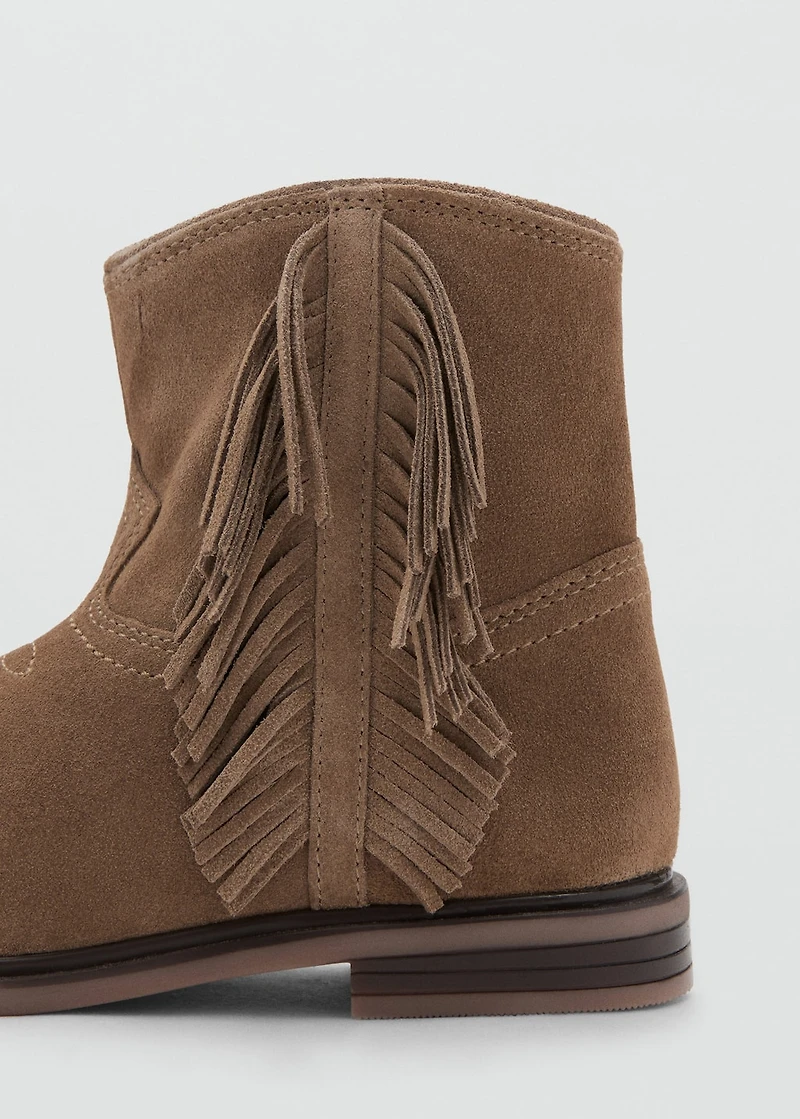 Fringed leather boots