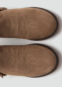 Fringed leather boots