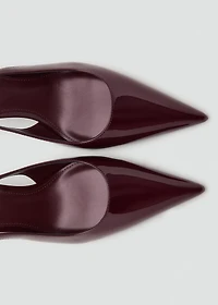 Patent heeled shoes