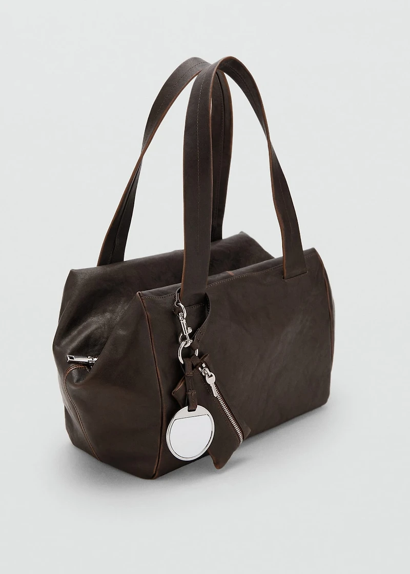 Medium leather shoulder bag with charms