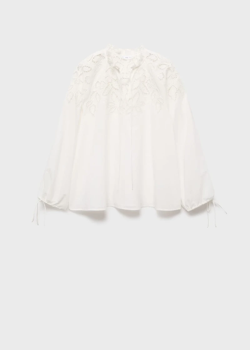 Embroidered blouse with bows