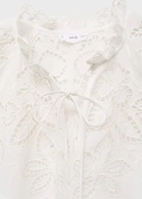 Embroidered blouse with bows