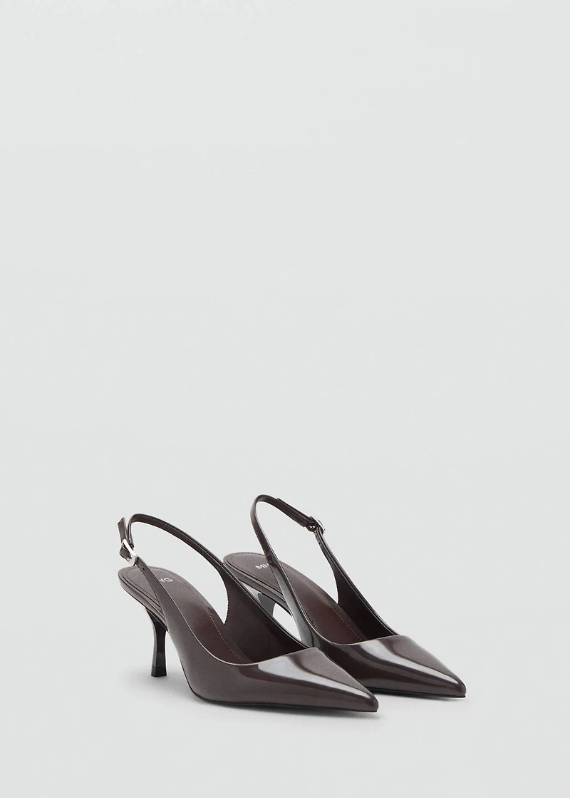 Pointed shoes with patent leather effect