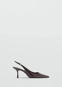 Pointed shoes with patent leather effect
