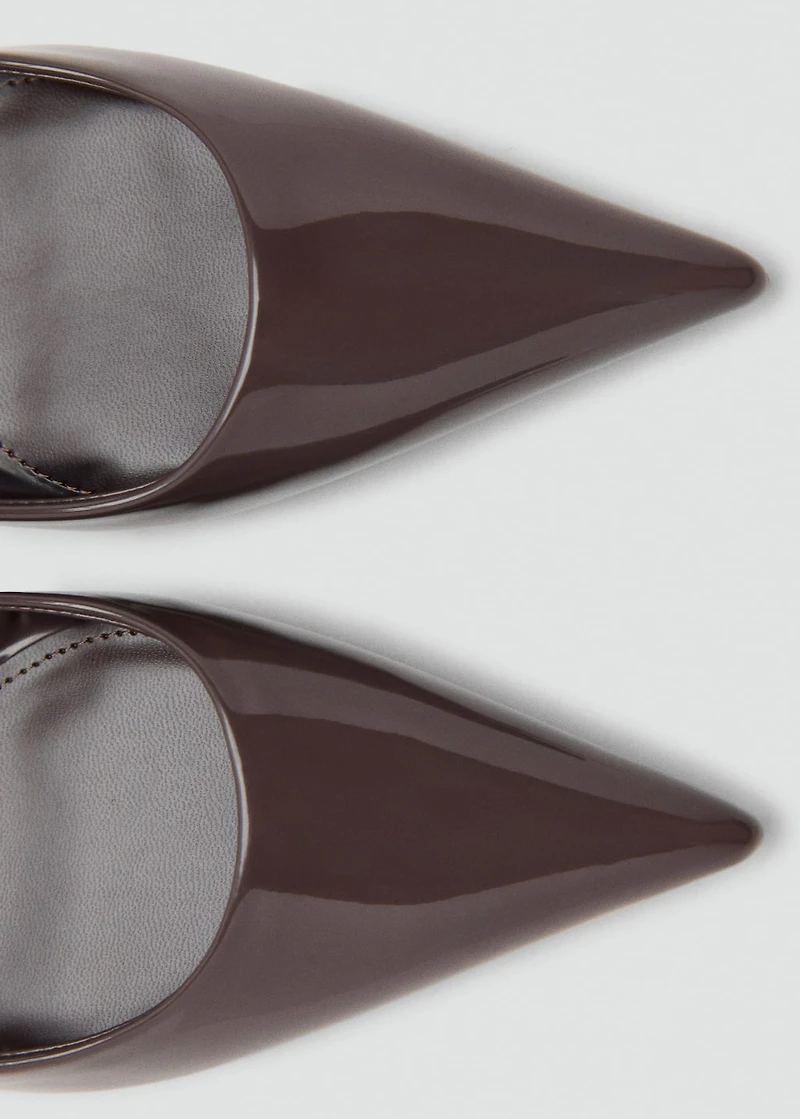 Pointed shoes with patent leather effect