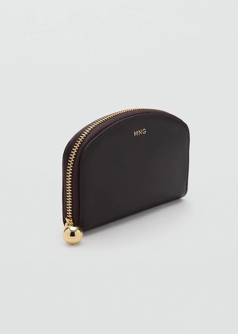 Oval wallet with mini-beads