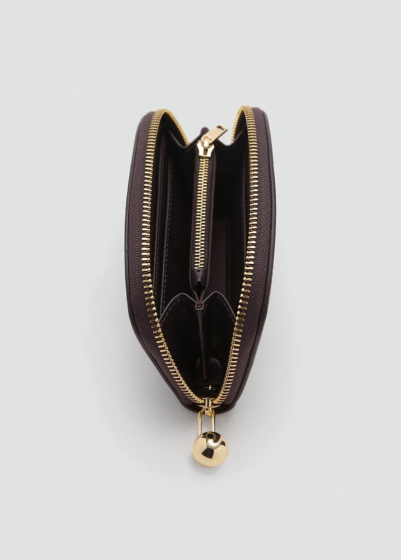 Oval wallet with mini-beads