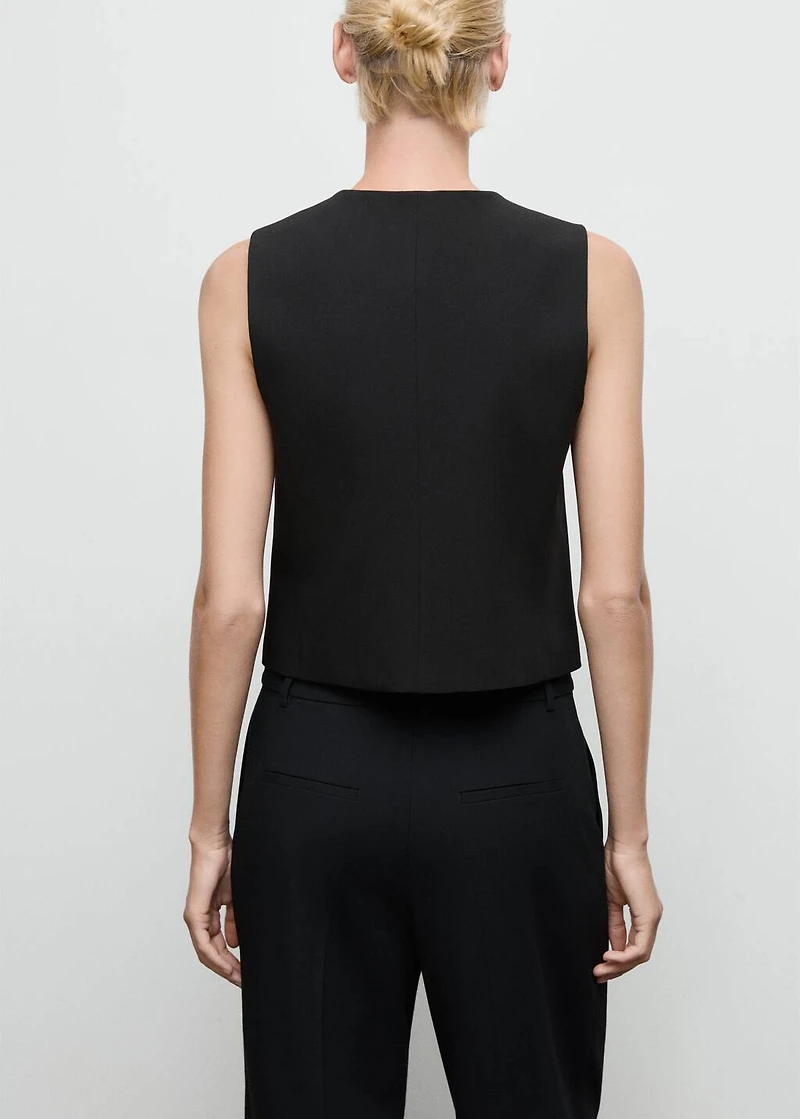 Vest with jewel buttons
