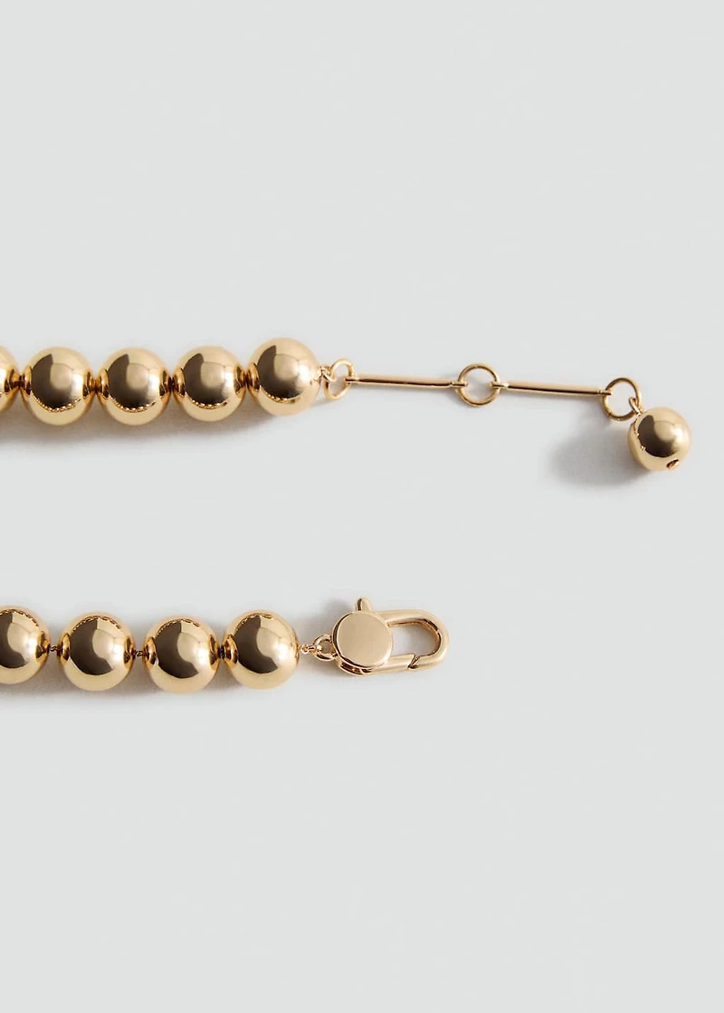 Metallic spheres necklace