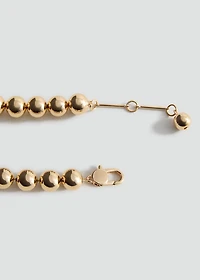 Metallic spheres necklace