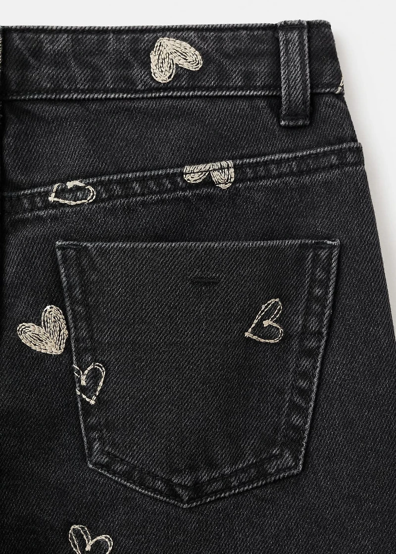 Jeans with embroidered heart
