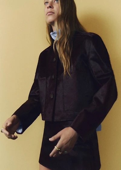 Leather and fur-effect jacket with pockets